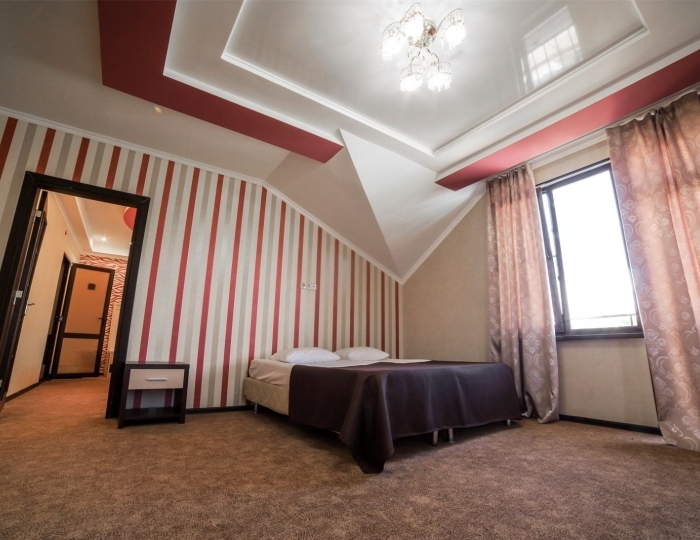 Двухкомнатный Люкс с балконом и кроватью размера «king-size» - Отель «Резиденция Апсны» Цандрипш